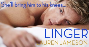 A handsome young man lying on his stomach on a bed and looking at the camera